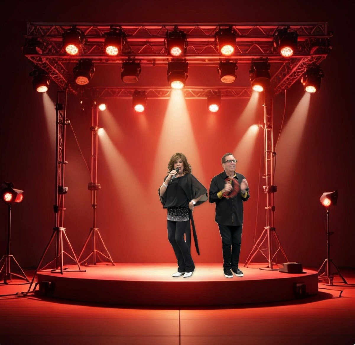 Iris Revson and Michael Finkelstein performing on stage under red stage lights