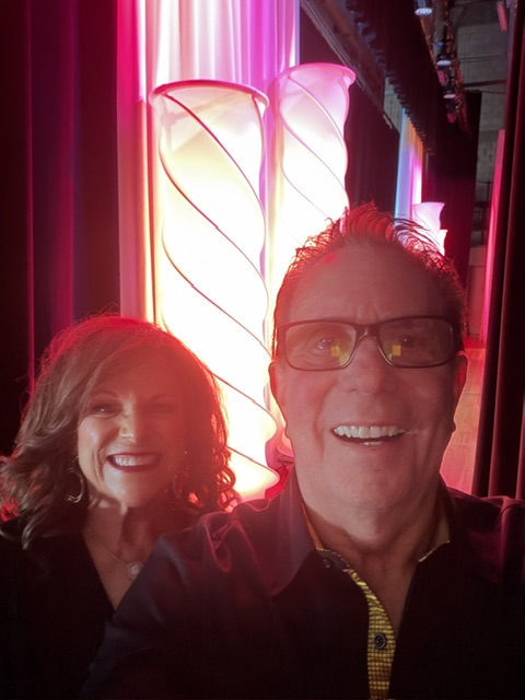 Iris Revson and Michael Finkelstein backstage smiling together